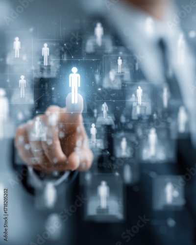 Businessmans Hand Selects Glowing Human Icon in Digital Network of People.