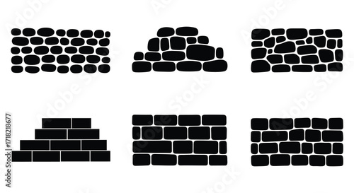 Arrangement of black stone shapes forming different brick and rock patterns