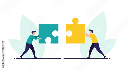 Two people connecting puzzle pieces teamwork concept.