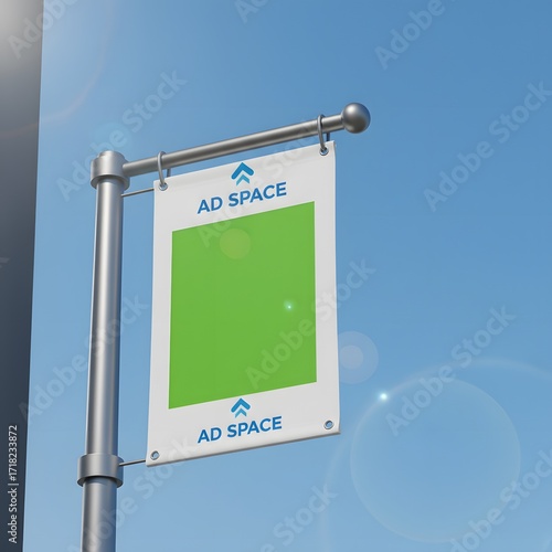 Vertical street pole banner mockup with a blank green screen for customizable ad space. Outdoor advertising concept for marketing and promotion