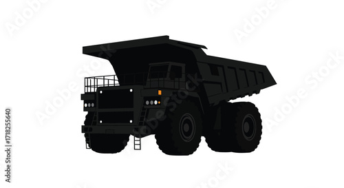 Large black silhouette of a heavy duty mining dump truck vehicle