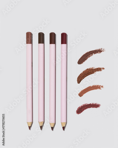 Lip liner set with product color swatches on grey background 
