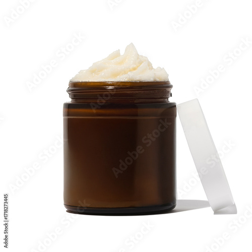 Whipped beef tallow skincare in amber jar on white background with texture