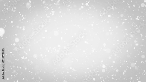 Abstract soft slow motion white particles animation. Christmas animated background. Seamless loop	