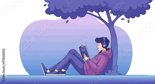 Person Relaxing And Reading A Book Under A Tree While Listening To Music