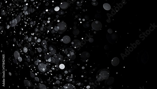 Abstract bokeh effect, light particles on dark background