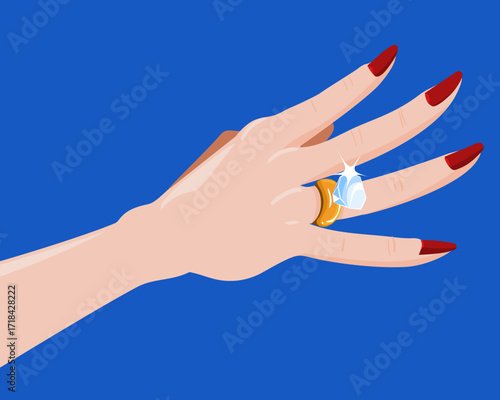Female hand with golden diamond ring
