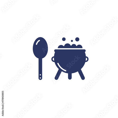 Cooking pot with bubbling contents and wooden spoon for Halloween  