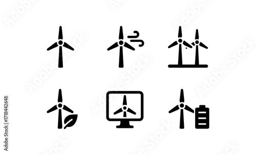 Silhouette wind turbine icons: renewable energy and green technology