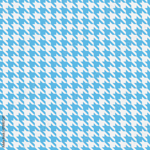 Classic blue and white houndstooth pattern.  Perfect for textile design, fashion, website backgrounds, or any project needing a sophisticated and timeless texture.