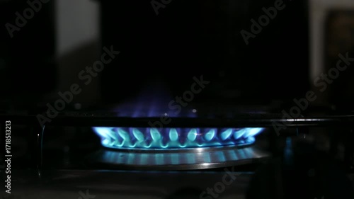 Close-up of a stove flame. Stove lit. Stove burner