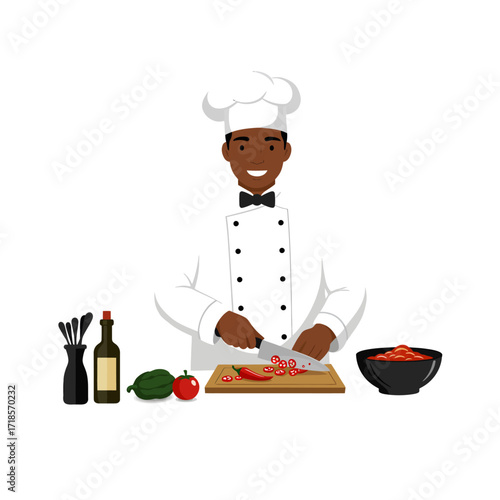 A smiling male chef in a white uniform expertly chops fresh vegetables on a cutting board, preparing a delicious meal.