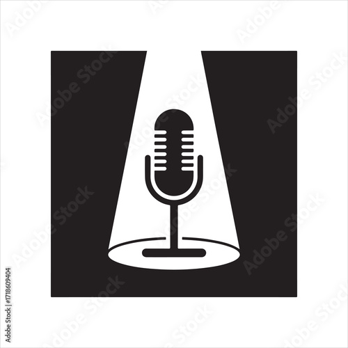 Microphone Icon in Spotlight for Performance and Presentation with Strong Contrast Black and White Design Element Emphasizing Audio Quality and Clarity for Broadcasts