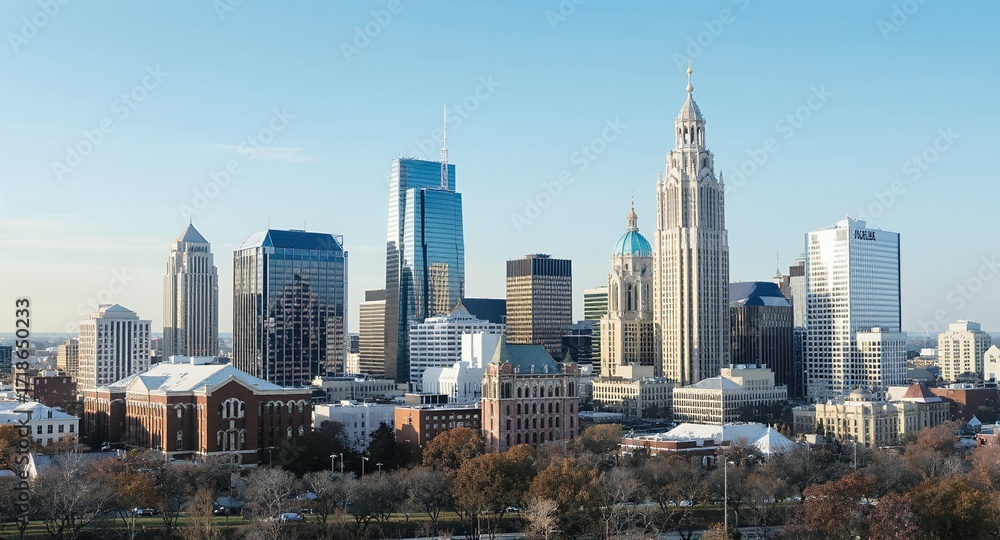 Fototapeta premium Stunning Skyline View of a Modern City with Tall Buildings and Clear Blue Sky