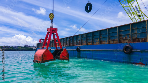 Marine Dredging Barge with Crane Excavating Seabed Soil
