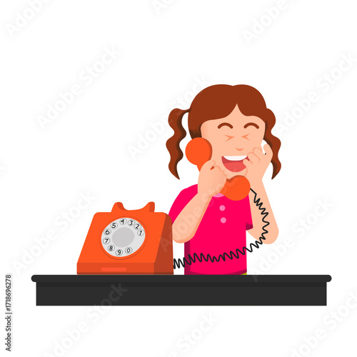 A little girl laughing while talking on a retro phone