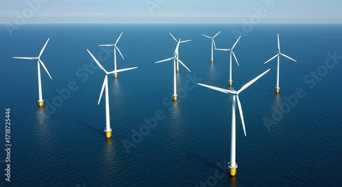 Majestic offshore wind turbines harness clean energy across vast blue ocean, powering a sustainable future with renewable technology
