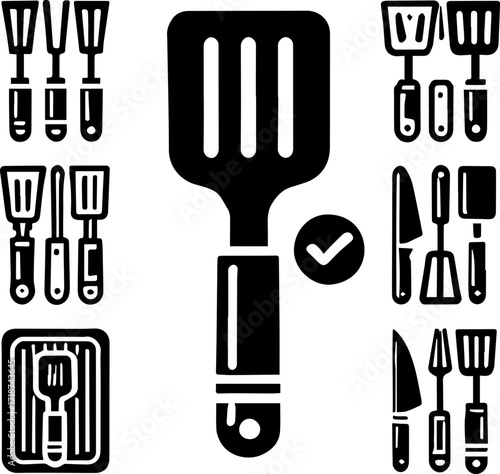 A collection of kitchen utensils including spatulas knives and forks neatly arranged in a grid pattern