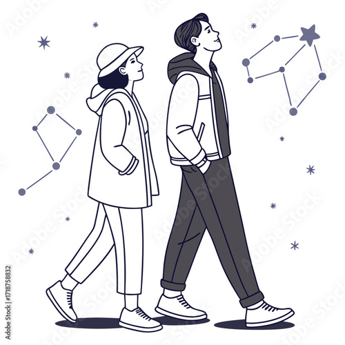 Couple walking together looking up at constellations and stars in the night sky