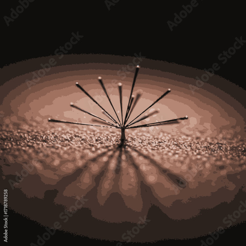A collection of sharp pins radiates outwards, casting long, dramatic shadows across a textured, granular surface in a sepia-toned, abstract composition.
