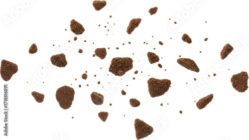 Scattered chocolate cookie crumbs and small pieces floating mid air isolate Food Brown Sweet Biscuit