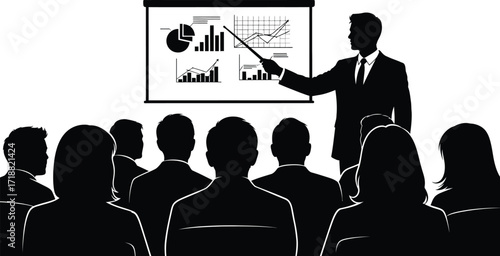 Business professional presenting data charts to an attentive audience during a meeting.