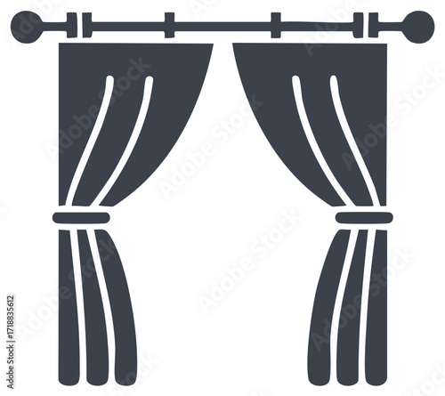 Elegant Drapes Hanging from a Curtain Rod with Tiebacks
