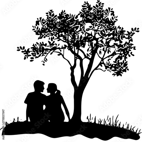 a couple sitting romantically under a tree
