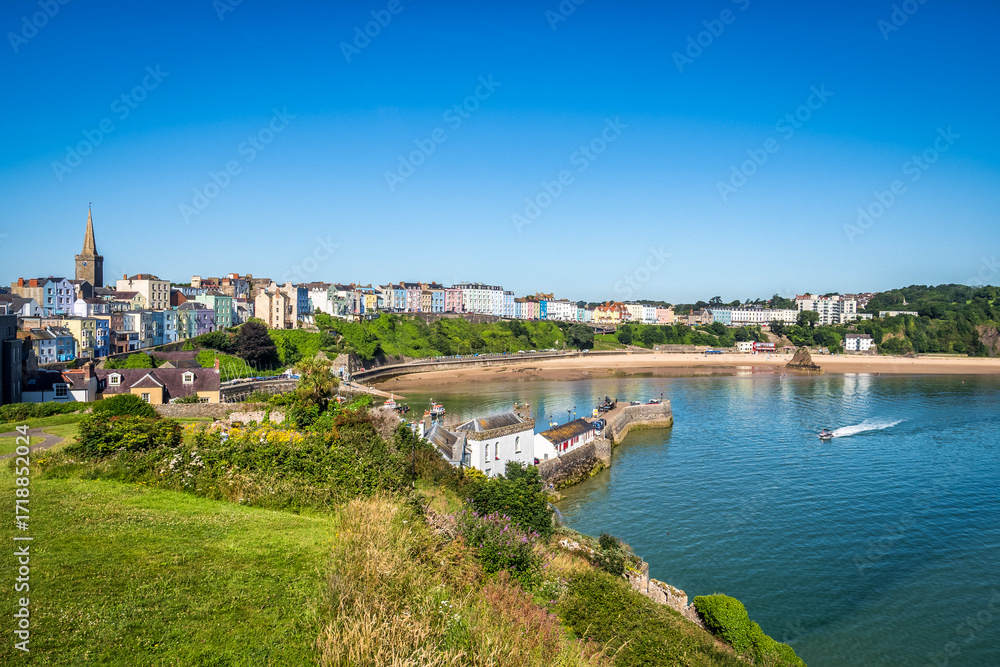 Fototapeta premium Tenby town and North Beach the view from below Tenby Castle, in Pembrokeshire, South Wales.