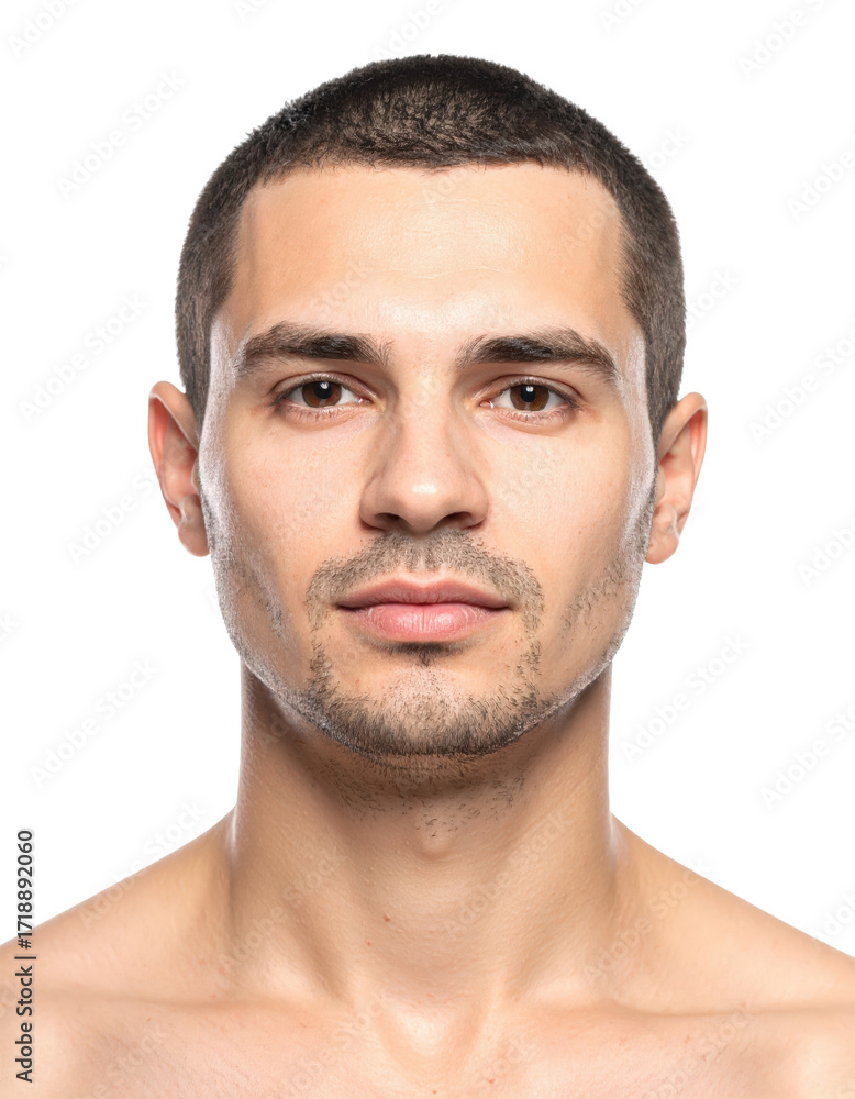 Fototapeta premium Portrait of a handsome man with short hair and stubble.