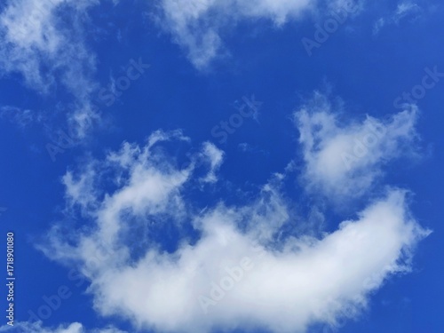 Natural sky background with soft clouds and clear atmosphere.