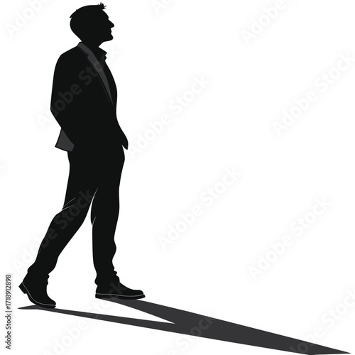 Silhouette of a man in a suit walking forward dark outline