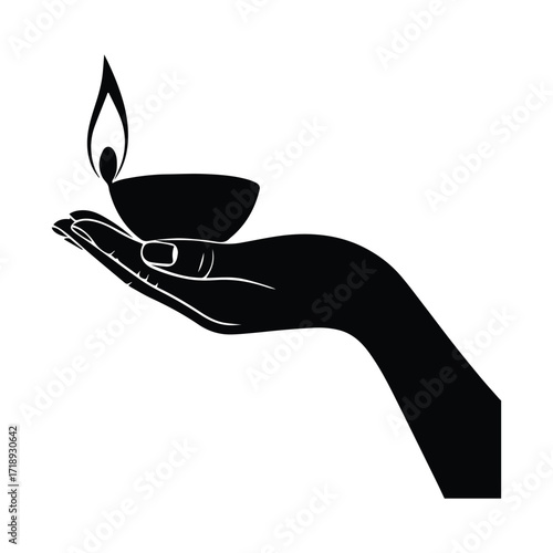 Elegant Hand Holding a Lit Diya Symbol of Hope and Enlightenment in Darkness