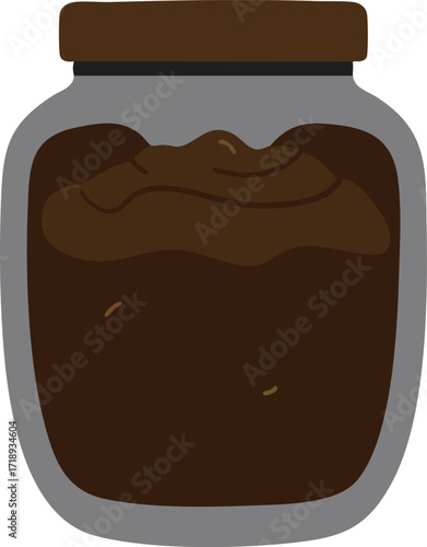 A glass jar filled with a dark brown substance, possibly jam or preserves.