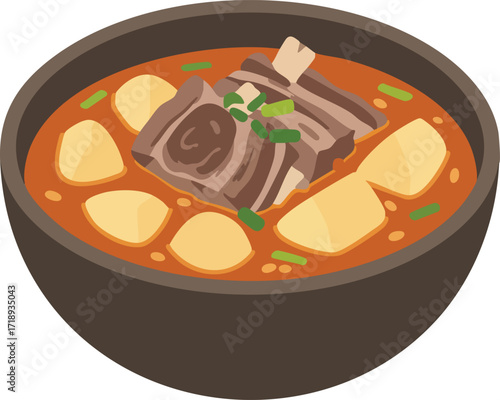 Bowl of hearty, reddish-brown soup with meat and potatoes.