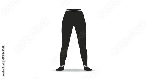 Silhouette of athletic leggings and socks against a clean white backdrop illustrating fashion and active lifestyle apparel on display