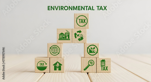 Environmental tax concept with wooden blocks and green icons.
