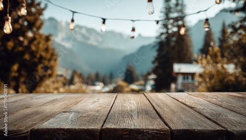 Wallpaper Mural Rustic wooden table, blurred mountain view, string lights Torontodigital.ca