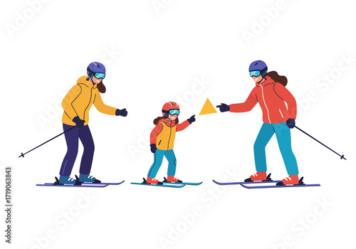 Three skiers two adults one child on skis with helmets pointing at a yellow triangle