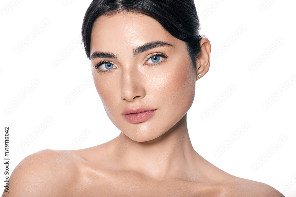 Fototapeta premium Beauty portrait of Caucasian young woman with healthy moisturized facial skin and natural plump lips. Beauty face concept. High quality