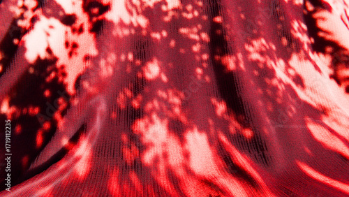 Tableau sur toile Red tie dye fabric showing abstract shapes and shadows