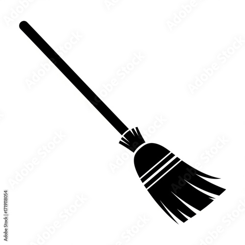 Black silhouette of a broom isolated on white background