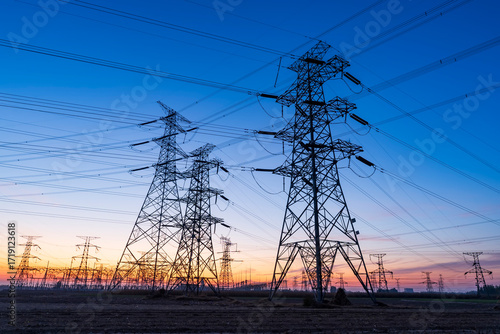 The pylons are in the evening, Substation in the evening, High voltage substation and beautiful sunset glow