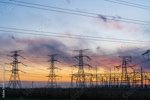 The pylons are in the evening, Substation in the evening, High voltage substation and beautiful sunset glow