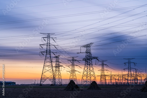 The pylons are in the evening, Substation in the evening, High voltage substation and beautiful sunset glow
