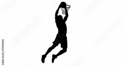 Silhouette of a basketball player leaping to dunk the ball into the hoop