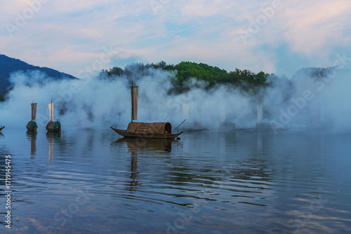Mountains, Oujiang River, fishing boats, and ancient towns in Lishui City, Zhejiang Province, China On May 24th, 2024	