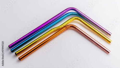 Wallpaper Mural Colorful metal drinking straws arranged in a stylized arc against a plain background Torontodigital.ca