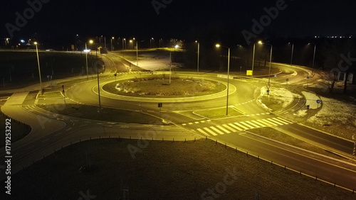 Illuminated Roundabout at Night with Street Lights.Novi Sad, Serbia 1.16.2024.