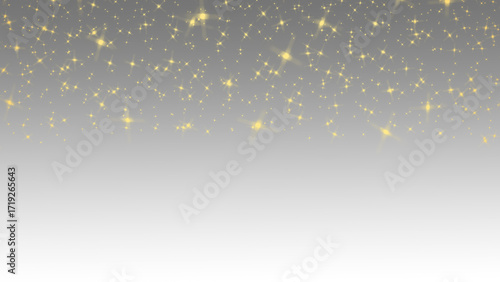 Foto Golden sparkles descending on a gray and white gradient background